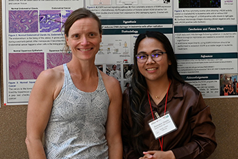 Two women at a poster presentation
